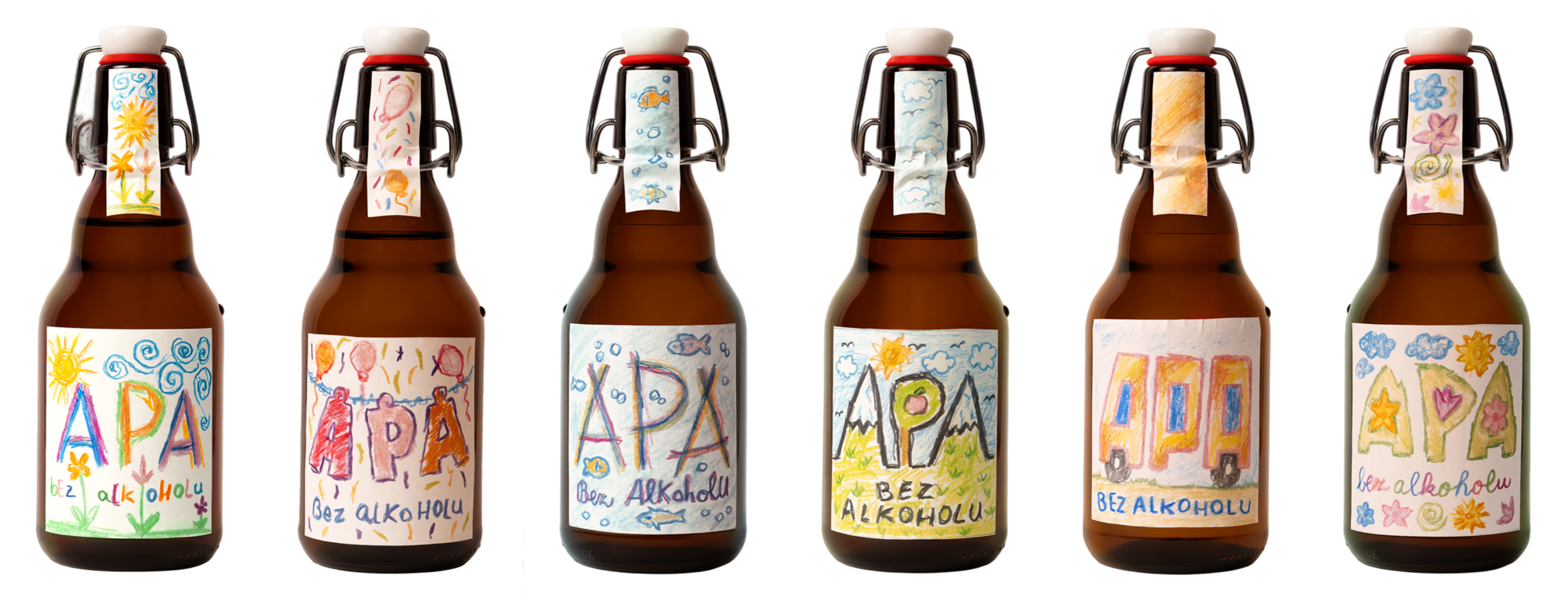 Šest lahví APA bez alkoholu s etiketami, které nakreslily děti