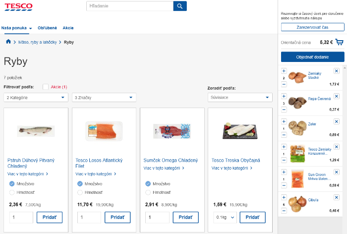Nákupní stránka Tesco s nabídkou různých druhů ryb a zeleniny v online košíku