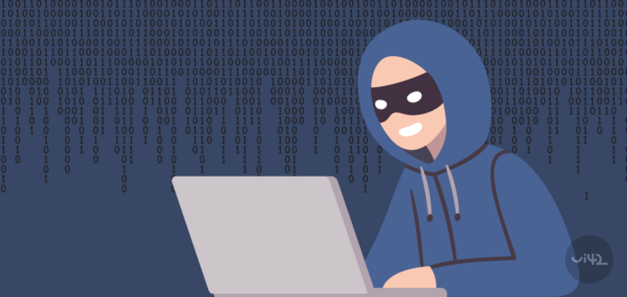 Ilustrace hackera pracujícího na notebooku, v pozadí binární kód.
